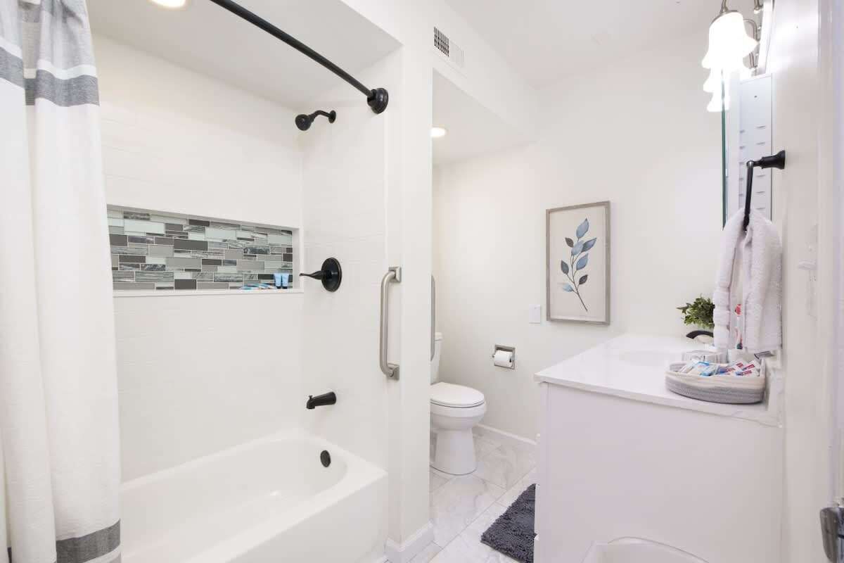 Shower, hair dryer, towels, shampoo