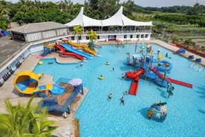 A water park with multiple slides and water play areas. - Longquan Xiangyuan Shared Farm (Wenchang)