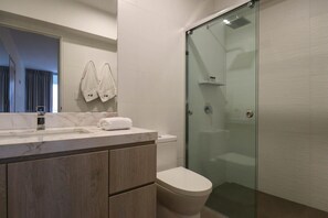 Shower, hair dryer, towels