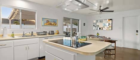 Coffee/tea maker, fridge, microwave, oven