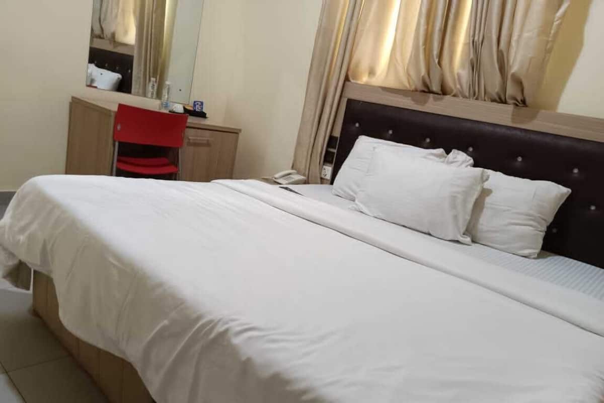 Habitación Business | 1 dormitorio y ropa de cama