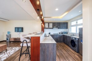 Family Apartment, 2 Bedrooms | Private kitchen | Fridge, microwave, stovetop, cookware/dishes/utensils - Roma Courts Serviced Apartments (Nairobi)
