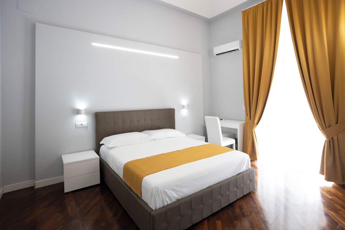 Quarto superior | 1 quarto, roupas de cama premium, edredons de pluma