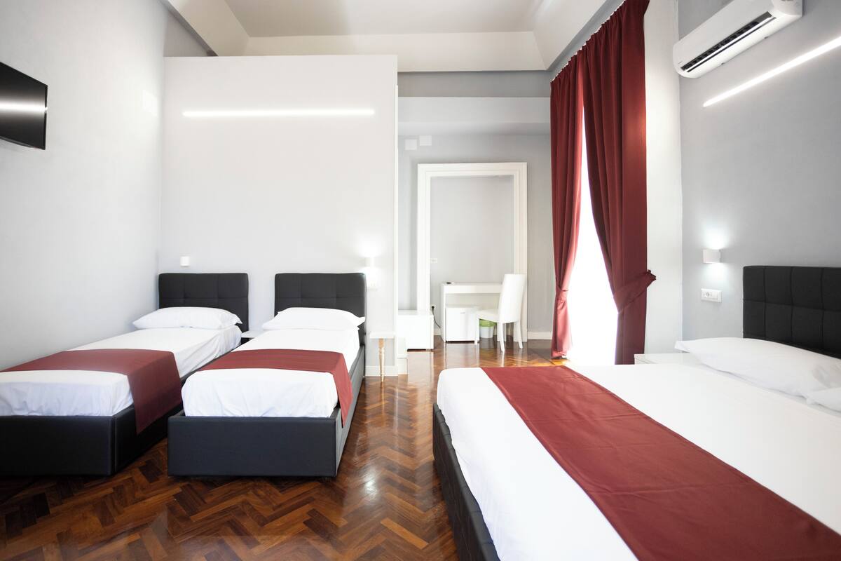 Superior Quadruple Room | Premium bedding, down comforters, desk, laptop workspace