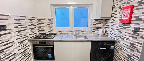 Apartemen, 2 Tempat Tidur Queen | Dapur pribadi | Lemari es, microwave, oven, dan kompor