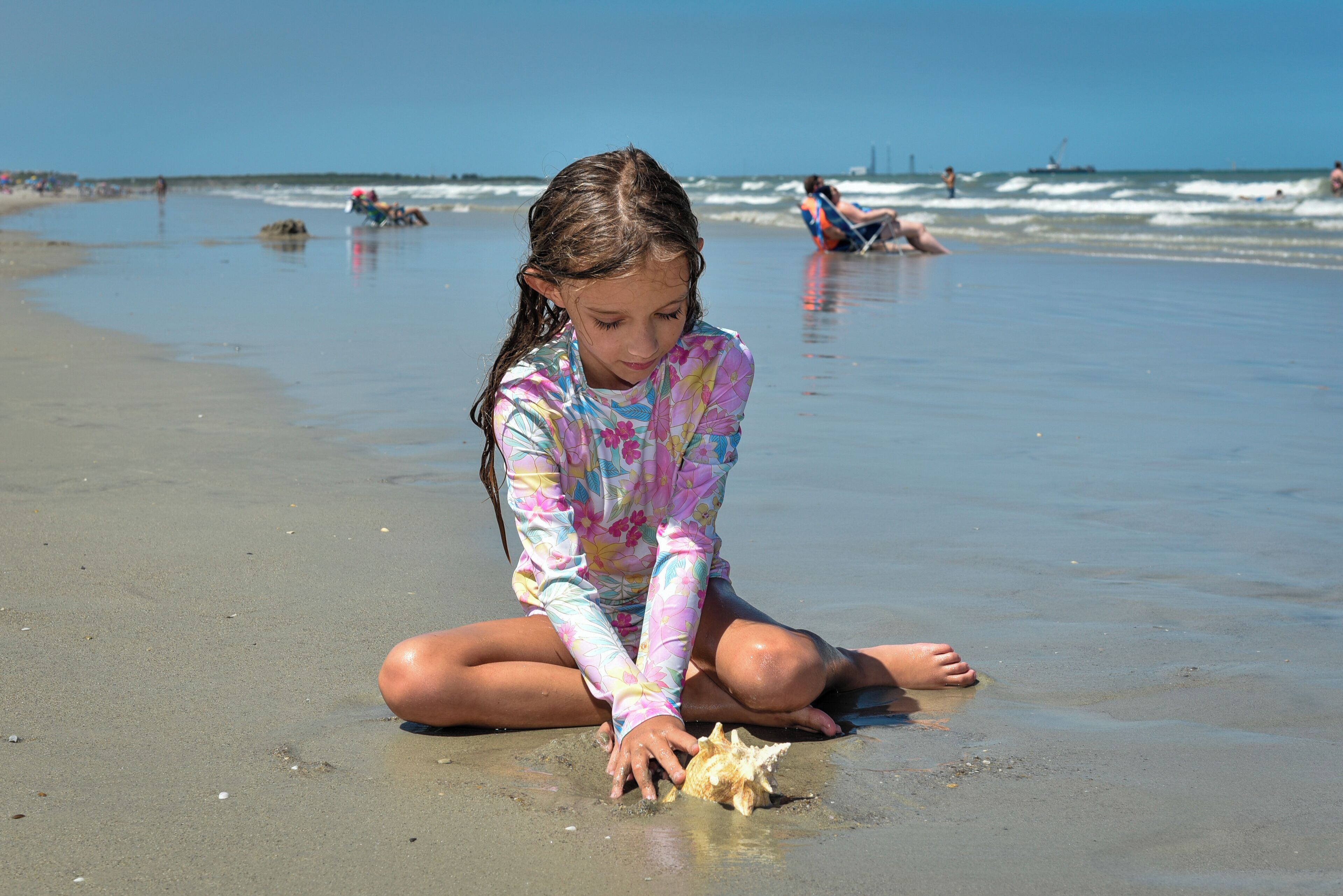 På stranden och strandhanddukar
