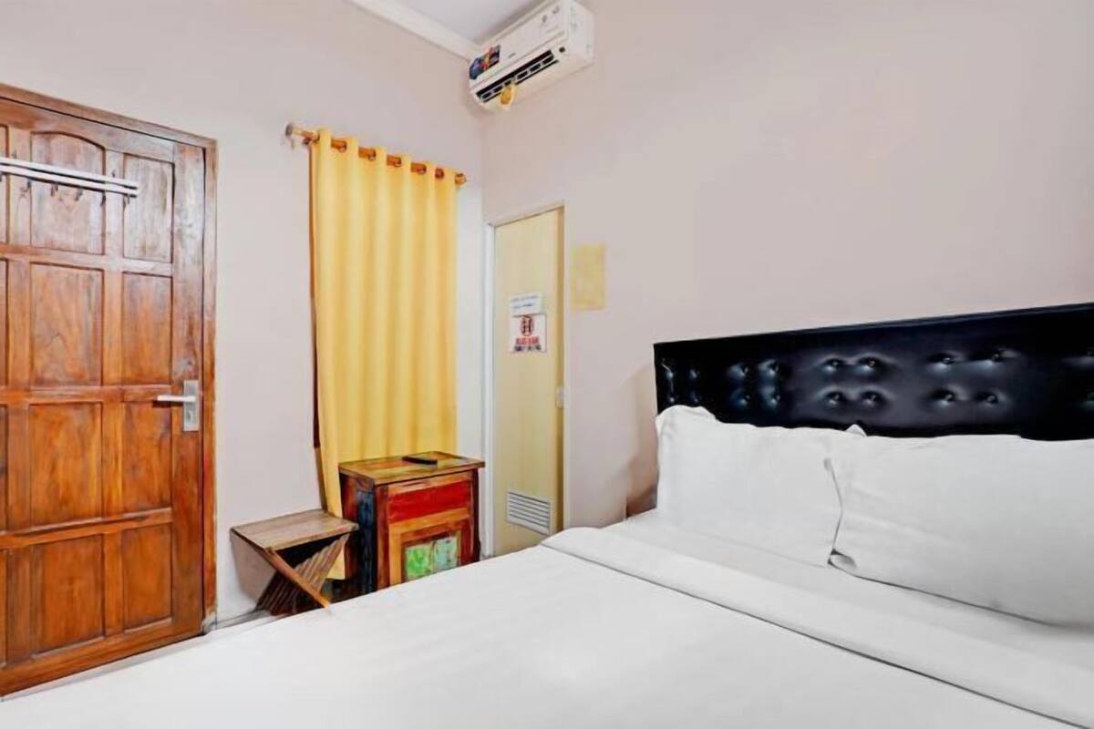 Espacio para trabajar con laptop, wifi gratis y ropa de cama 