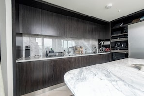 Deluxe Apartment, 3 Bedrooms, City View | Private kitchen | Full-size fridge, microwave, oven, dishwasher