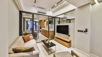 Comfort Apartment | Ruang tamu | TV LCD