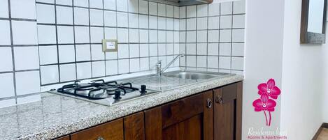 Stovetop, high chair, cookware/dishes/utensils