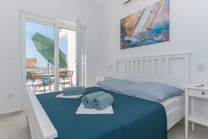 4 عدّة غرف نوم ومكواة/لوح كي وواي فاي وملاءات أسرّة