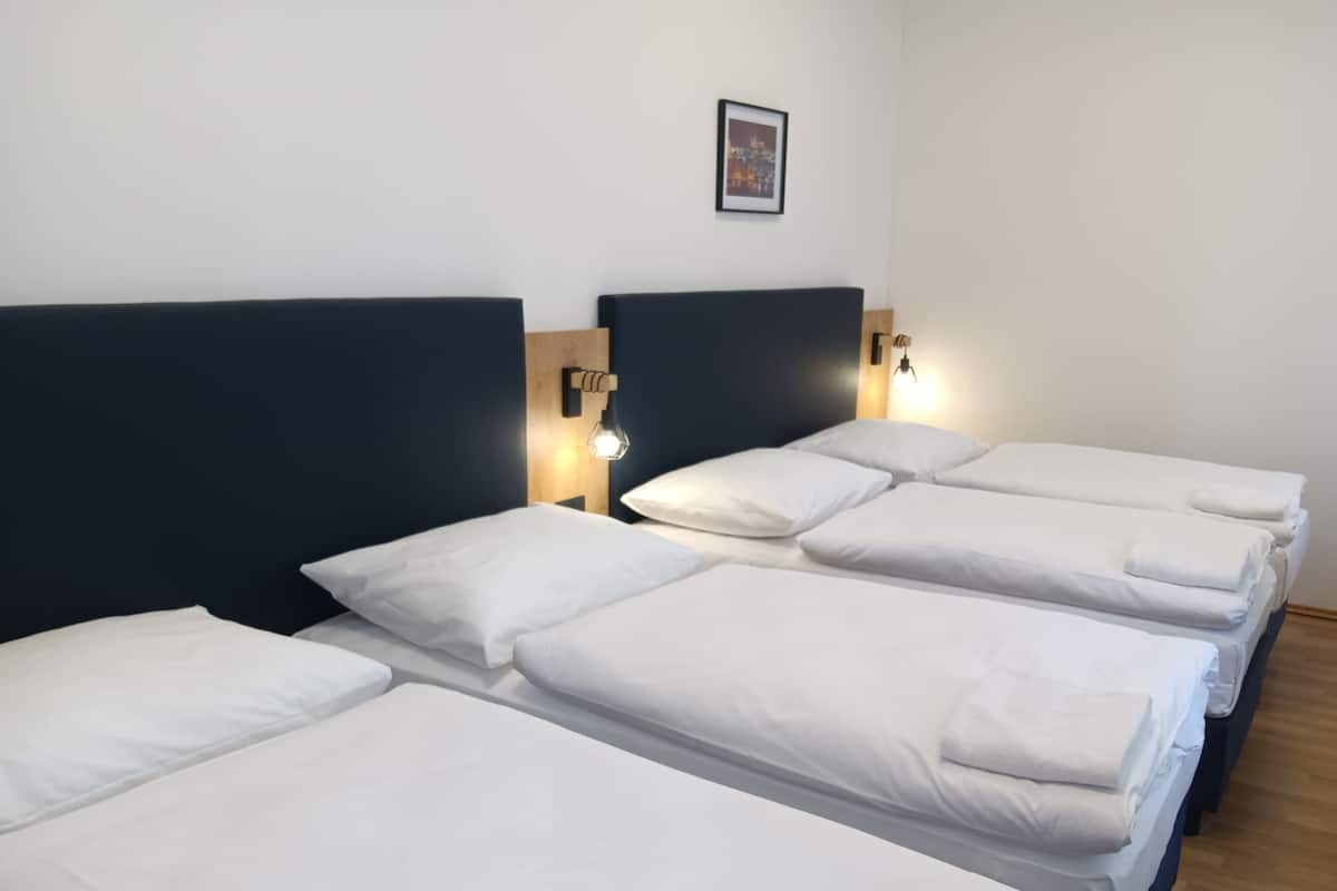 Suite 24 B | 3 dormitorios, escritorio, wifi gratis y ropa de cama
