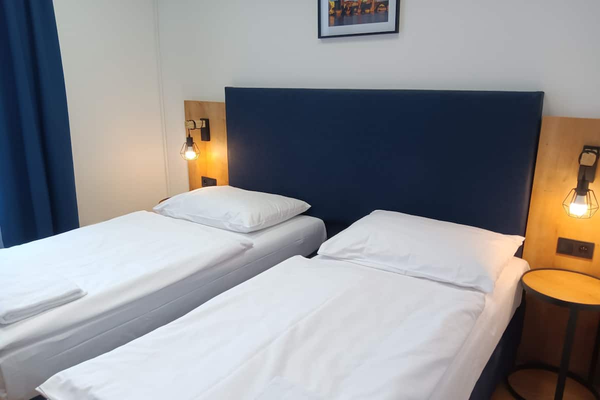 Suite 44 A | 3 dormitorios, escritorio, wifi gratis y ropa de cama