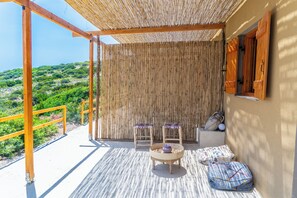 Junior Suite, Sea View | Terrace/patio - Exoristoi Nature Suites (Gavdos)