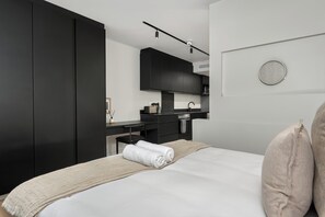 1 chambre, coffres-forts dans les chambres, fer et planche à repasser