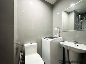 Shower, bidet, towels, soap