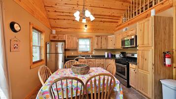 Cabin, Multiple Beds, Kitchen | Private kitchen | Fridge, microwave, stovetop, coffee/tea maker