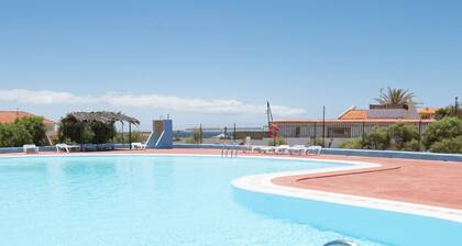 Escape to the Blue House on a Dream Island