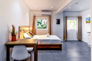 Desk, laptop workspace, free WiFi, bed sheets