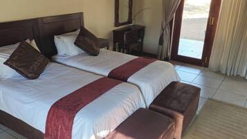 Habitación Deluxe con 1 cama matrimonial o 2 individuales | 1 habitación, ropa de cama de alta calidad y camas con pillow-top