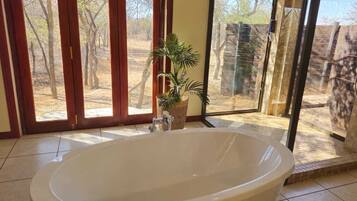 Luxury Chalet, Park View | Bathroom | Separate tub and shower, deep soaking tub, rainfall showerhead
