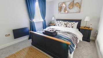 2 dormitorios, tabla de planchar con plancha, wifi y ropa de cama