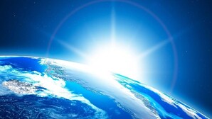 A view of Earth from space with a bright sun in the background. - dfdfdfdfdfdf (Amritsar)