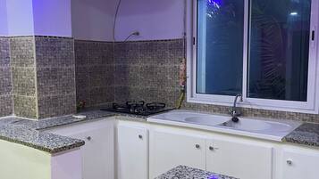 Fridge, stovetop, cookware/dishes/utensils