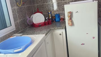 Fridge, stovetop, cookware/dishes/utensils