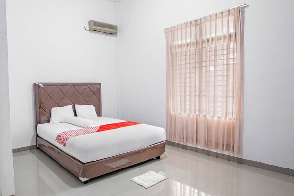 Chambre Double Deluxe | Espace de travail pour ordinateur portable, Wi-Fi gratuit, draps fournis