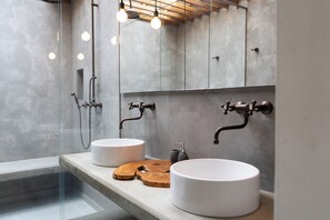 Shower, towels, soap, toilet paper