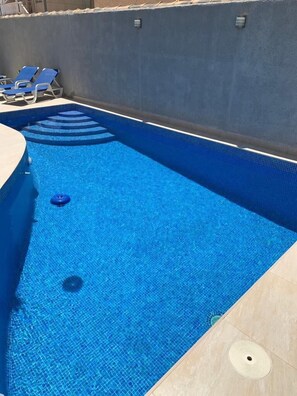 Et oppvarmet basseng