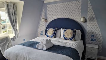 Deluxe kamer | Luxe beddengoed, Select Comfort-bedden, een minibar