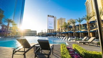 Seasonal outdoor pool, cabanas (surcharge), pool umbrellas