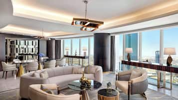 Royal Suite, 1 King Bed | Living area | 65-inch flat-screen TV with cable channels, TV, offices