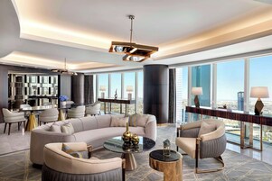 Royal Suite, 1 King Bed | Living area | 65-inch flat-screen TV with cable channels, TV, offices