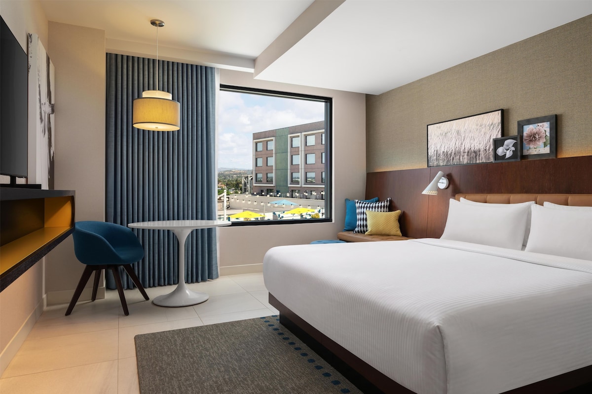 Frette Italian sheets, premium bedding, desk, laptop workspace