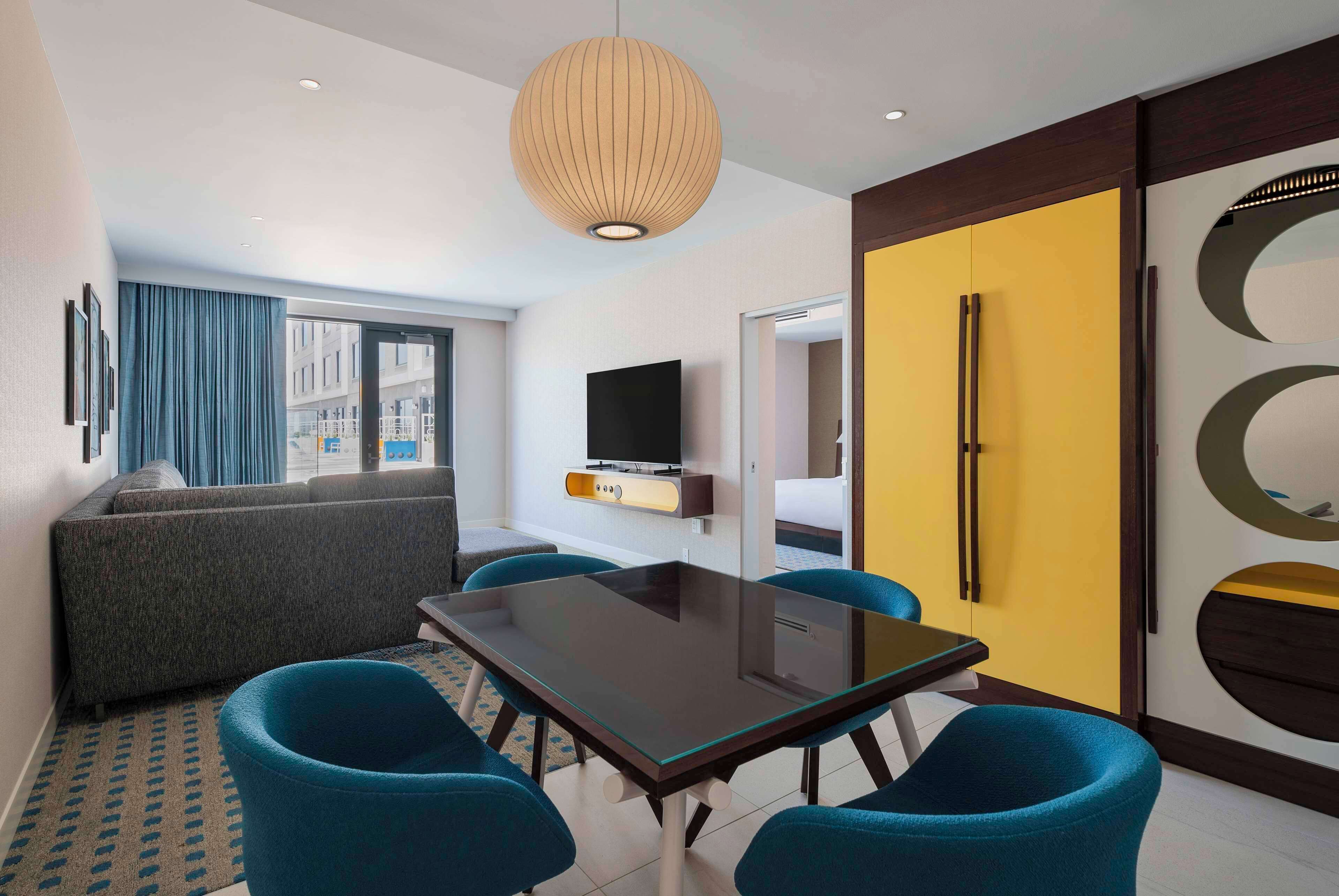 55-inch flat-screen TV with cable channels, pay films