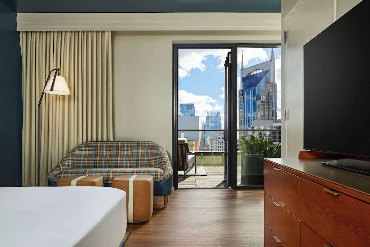 Penthouse, 1 Bedroom | Living area | 43-inch flat-screen TV with cable channels