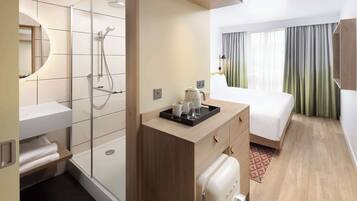 Room, 1 King Bed | Bathroom | Shower, rainfall showerhead, eco-friendly toiletries, hair dryer