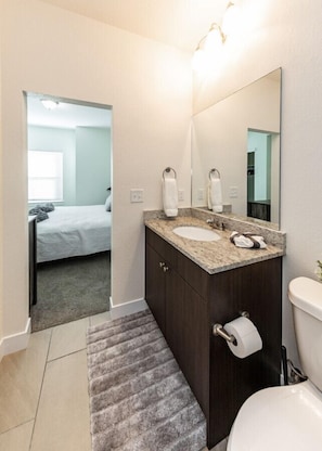 Shower, towels, soap, toilet paper