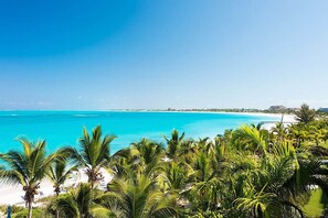 On the beach, sun-loungers, beach towels