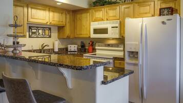 Dishwasher, toaster, cookware/dishes/utensils, dining tables