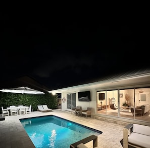 Outdoor pool, a heated pool - Boho Chic with Heated Pool Home in Jupiter! (Tequesta)