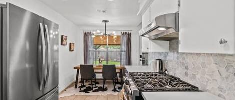 Fridge, dishwasher, cookware/dishes/utensils