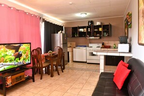 Superior Studio | Living area | 50-inch Smart TV with digital channels, Netflix, pay movies