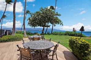 Outdoor dining - Kanai a Nalu 314 - Modern, Renovated, Oceanfront Condo, Breathtaking Views, AC! (Wailuku)
