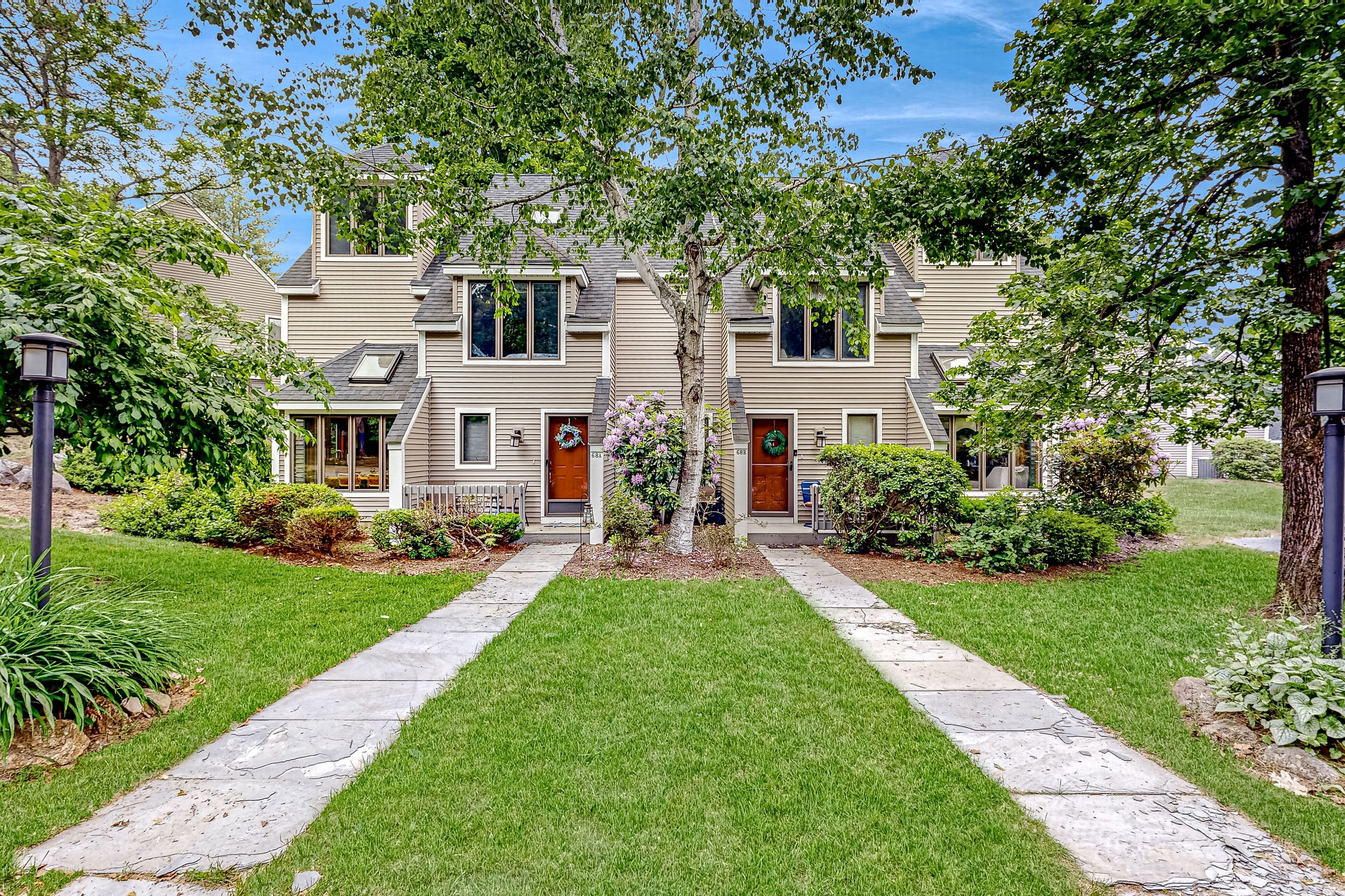 Spacious townhouse with wood fireplace, W/D, on-site pool, community beach