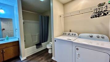 Hair dryer, towels, soap, shampoo