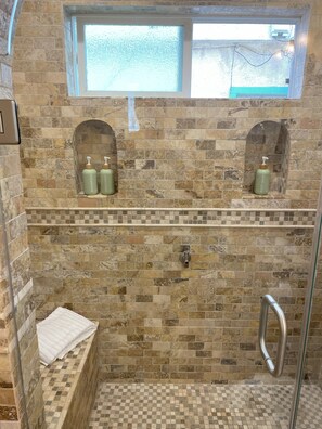 Shower, hair dryer, towels, soap